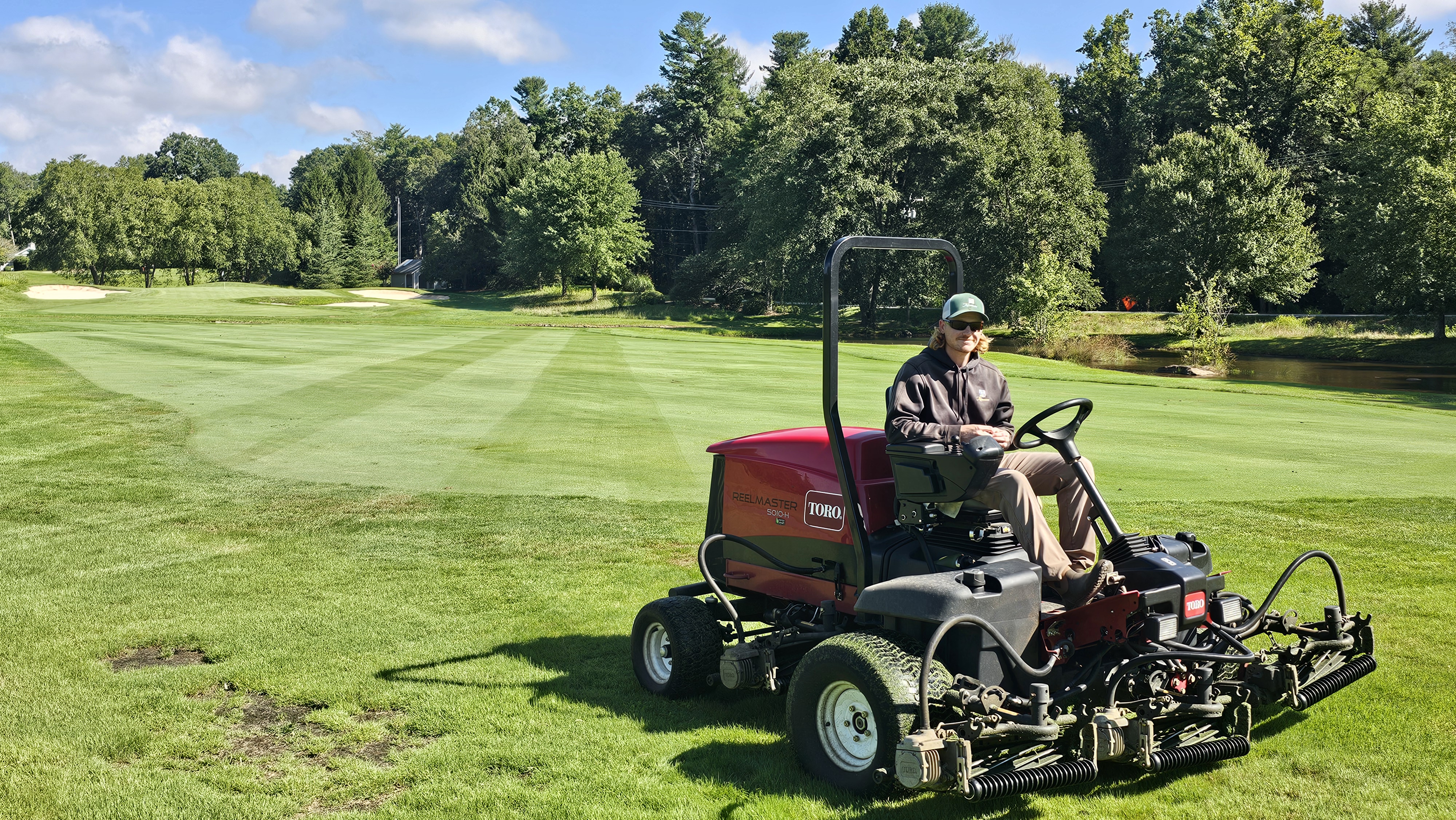 Austin mowing fairways with Toro Reelmaster 5010H